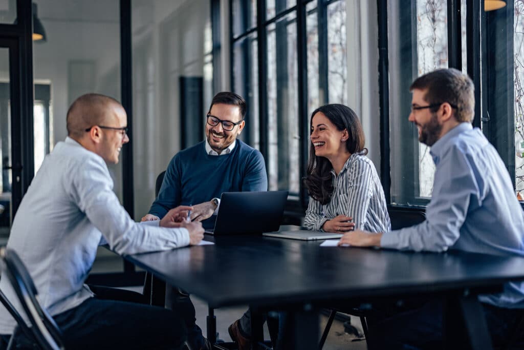 IT consulting team discussing services